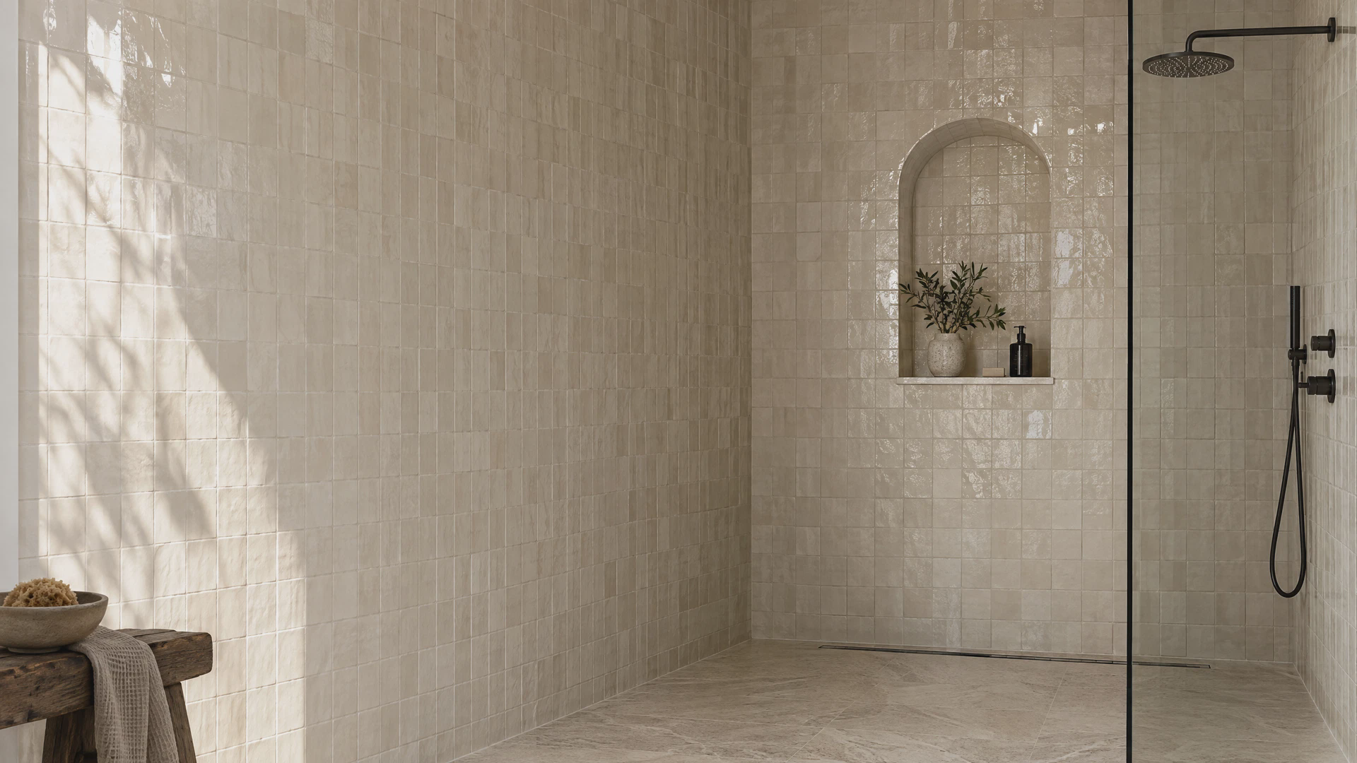 Warm ivory tile installation in a refined walk-in shower