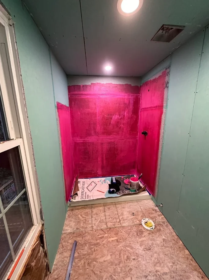 White marble tile master bathroom in a Poncey-Highland home